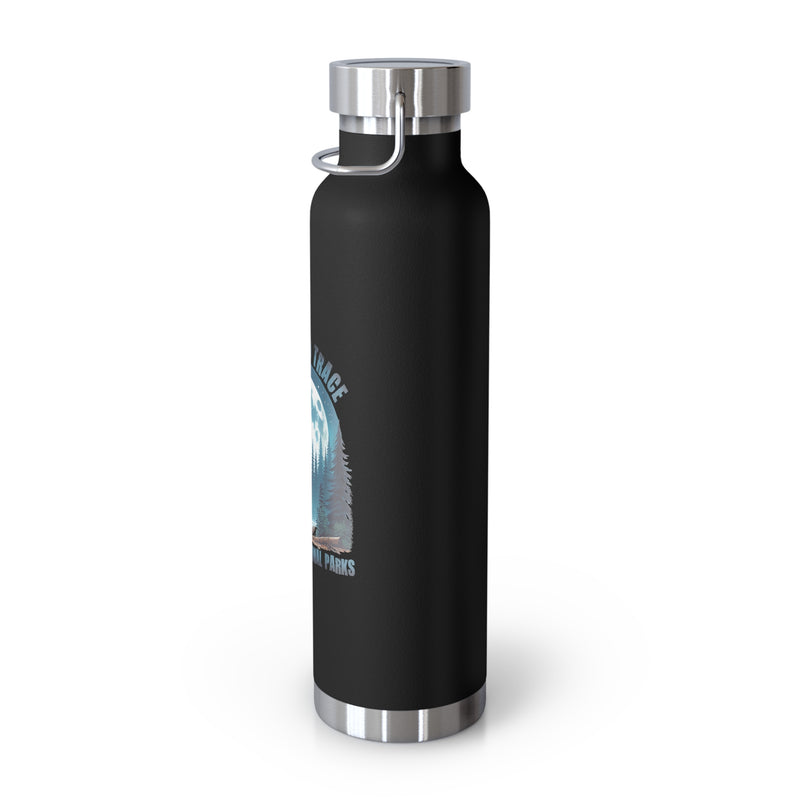 Water bottle with Leave No Trace design featuring a bear silhouette and a full moon, promoting conservation in America's national parks.