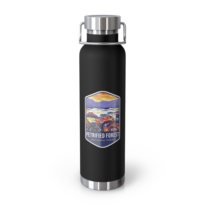 Black stainless steel water bottle featuring a colorful design of Petrified Forest National Park with scenic landscapes.