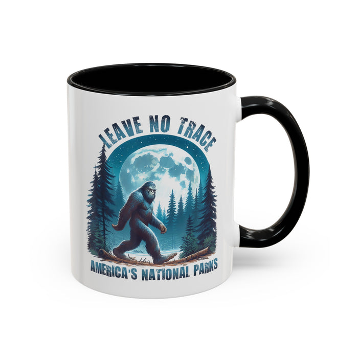 11 oz black ceramic mug with Bigfoot graphic and "Leave No Trace" text, featuring Yosemite National Park scenery.