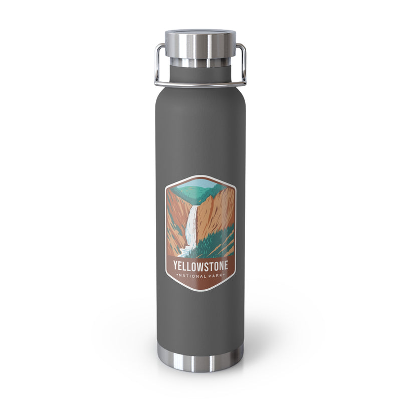 Grey stainless steel water bottle featuring a design of Yellowstone National Park with a waterfall and canyon scenery.