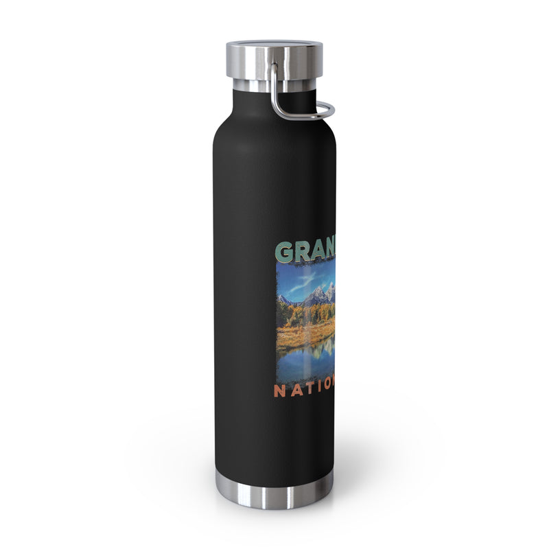 Grand Teton National Park souvenir water bottle featuring a scenic mountain reflection design with stainless steel construction.