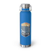 Pebble blue stainless steel water bottle with a scenic design of Kings Canyon National Park.