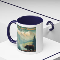 11 oz navy ceramic mug featuring an illustration of a bear in Great Smoky Mountains National Park with mountains and trees in the background.