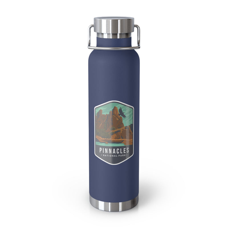 Navy stainless steel water bottle featuring a design of Pinnacles National Park with rock formations.