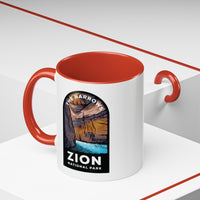 11 oz ceramic mug with red contrasting handle featuring a design of The Narrows at Zion National Park, perfect as a souvenir.