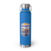 Pebble blue stainless steel water bottle featuring a colorful design of Petrified Forest National Park with scenic landscapes.