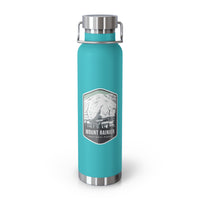 Mint green stainless steel water bottle with a scenic design of Mount Rainier National Park.