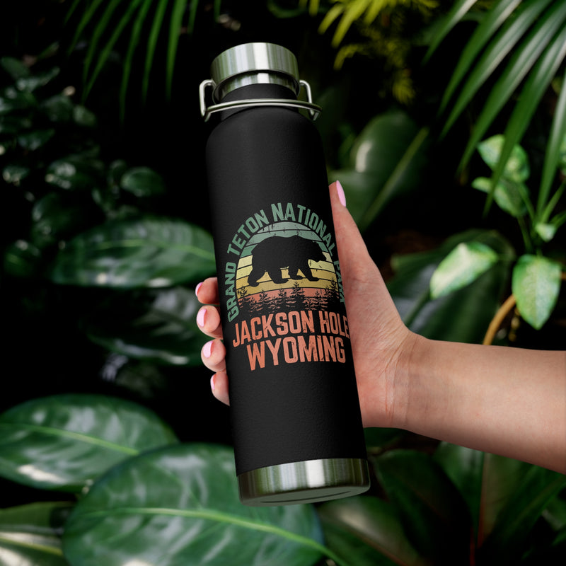 Grand Teton National Park souvenir water bottle featuring a bear design and Jackson Hole, Wyoming text with stainless steel construction.