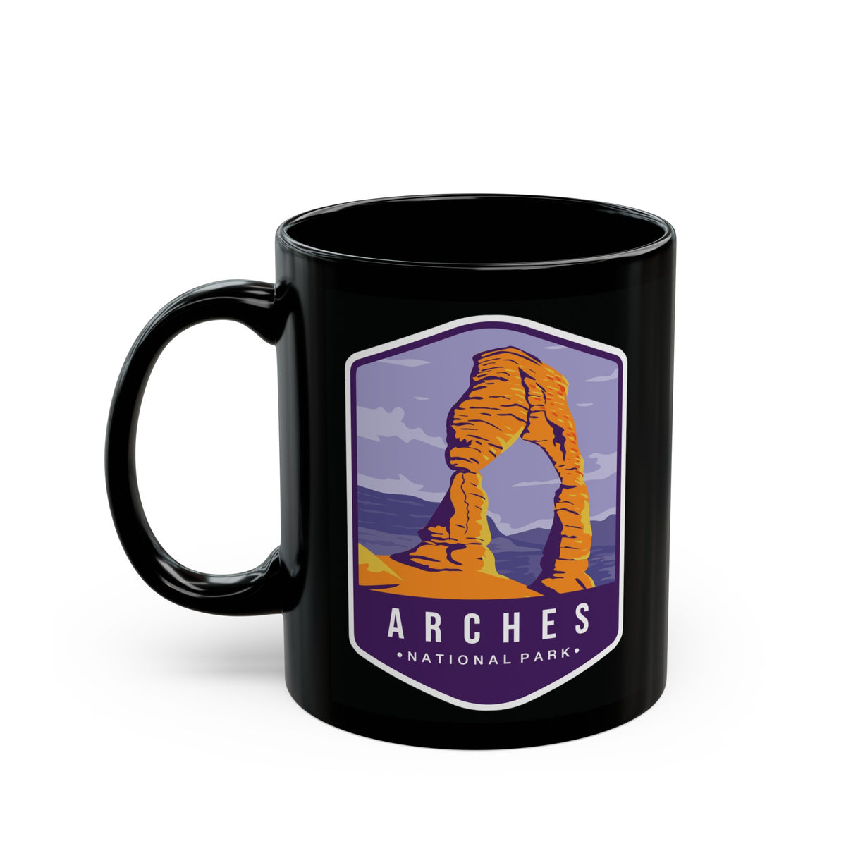 Ceramic coffee mug featuring a scenic design with Delicate Arch at Arches National Park.