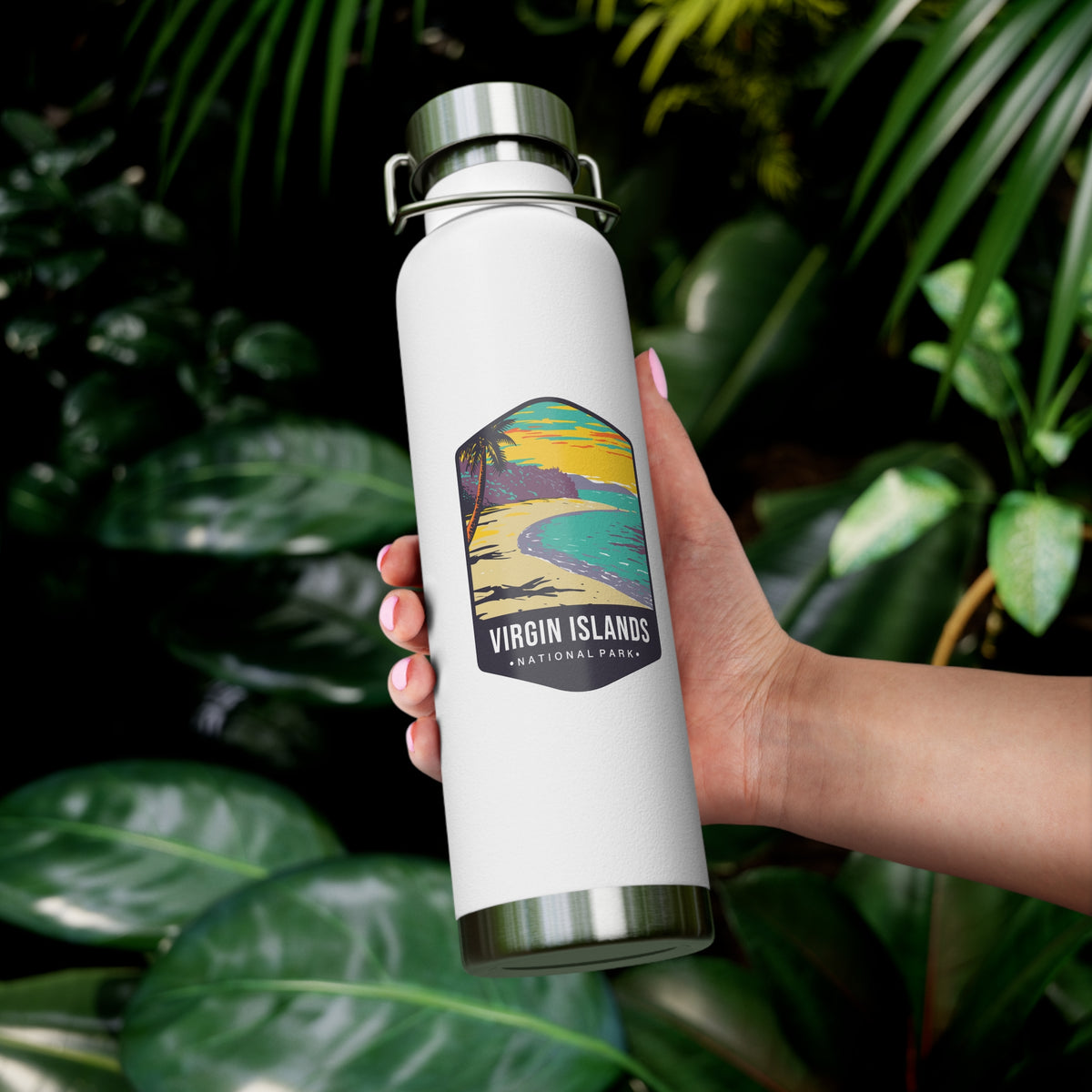 White stainless steel water bottle featuring a design of Virgin Islands National Park with a beach and palm trees.