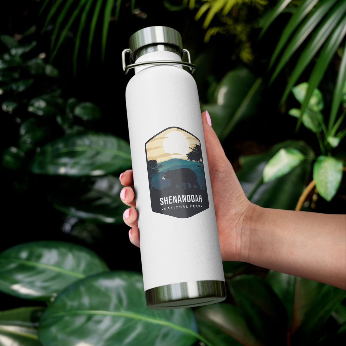 White stainless steel water bottle featuring a design of Shenandoah National Park with mountain and sunset scenery.