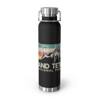 Grand Teton National Park souvenir water bottle featuring a mountain scene design with stainless steel construction.