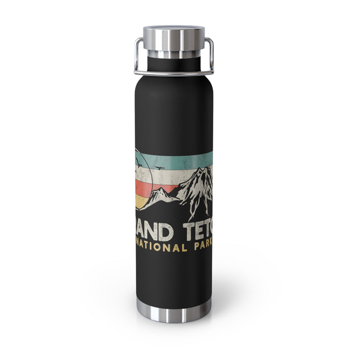 Grand Teton National Park souvenir water bottle featuring a mountain scene design with stainless steel construction.