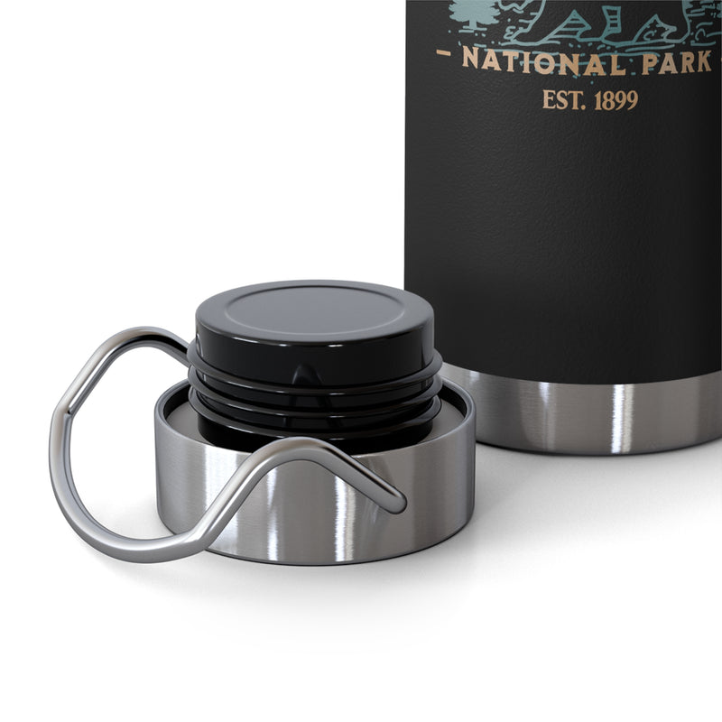 Stainless steel water bottle featuring a Mount Rainier National Park design with a bear and mountain illustration, durable powder-coated finish.