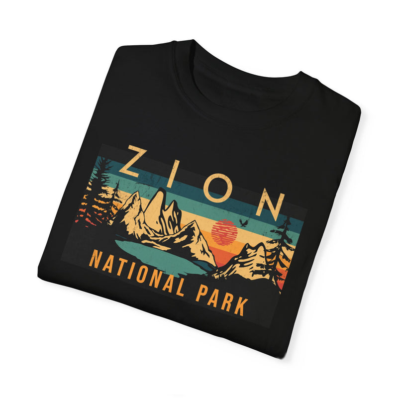 T-shirt featuring a mountain and sunset design for Zion National Park.