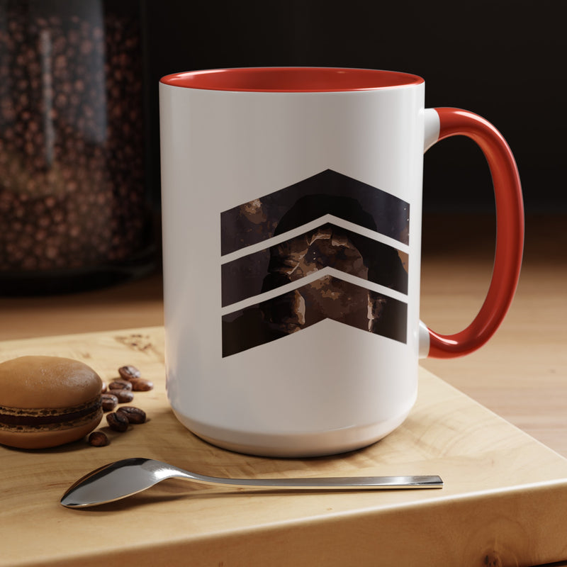 15 oz ceramic mug with red handle featuring a mountain design with three chevrons, representing Arches National Park.