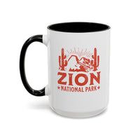 15 oz ceramic mug with black contrasting handle featuring a cactus design of Zion National Park, perfect as a souvenir.