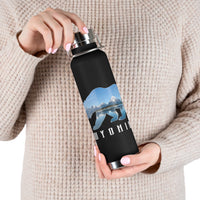 Grand Teton National Park souvenir water bottle featuring a bear scene design with stainless steel construction.