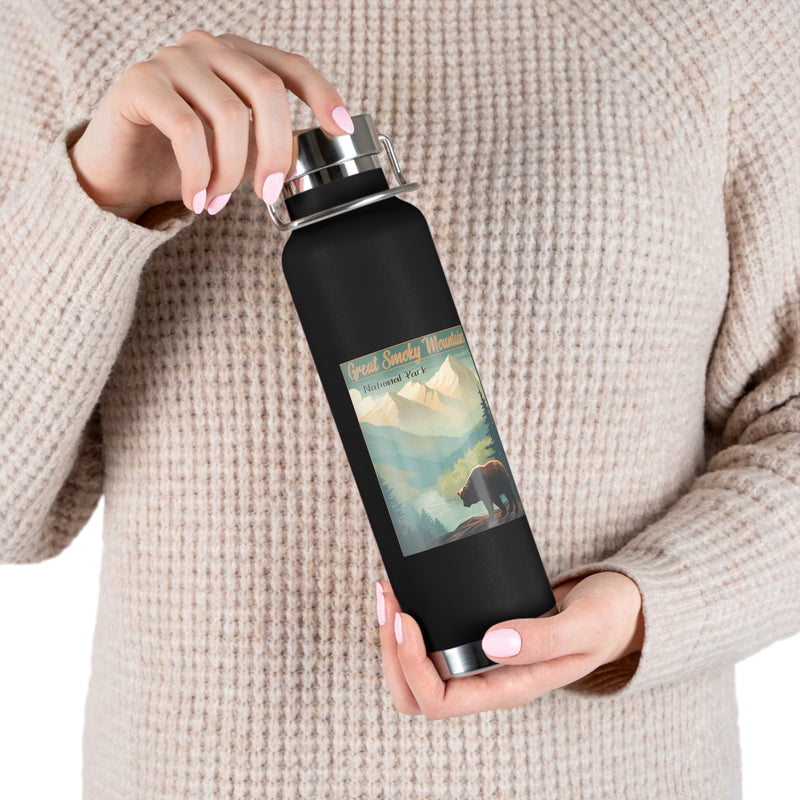 Image of an insulated souvenir bottle featuring a scenic bear and mountain design from Great Smoky Mountains National Park, with the text "Tennessee & North Carolina."