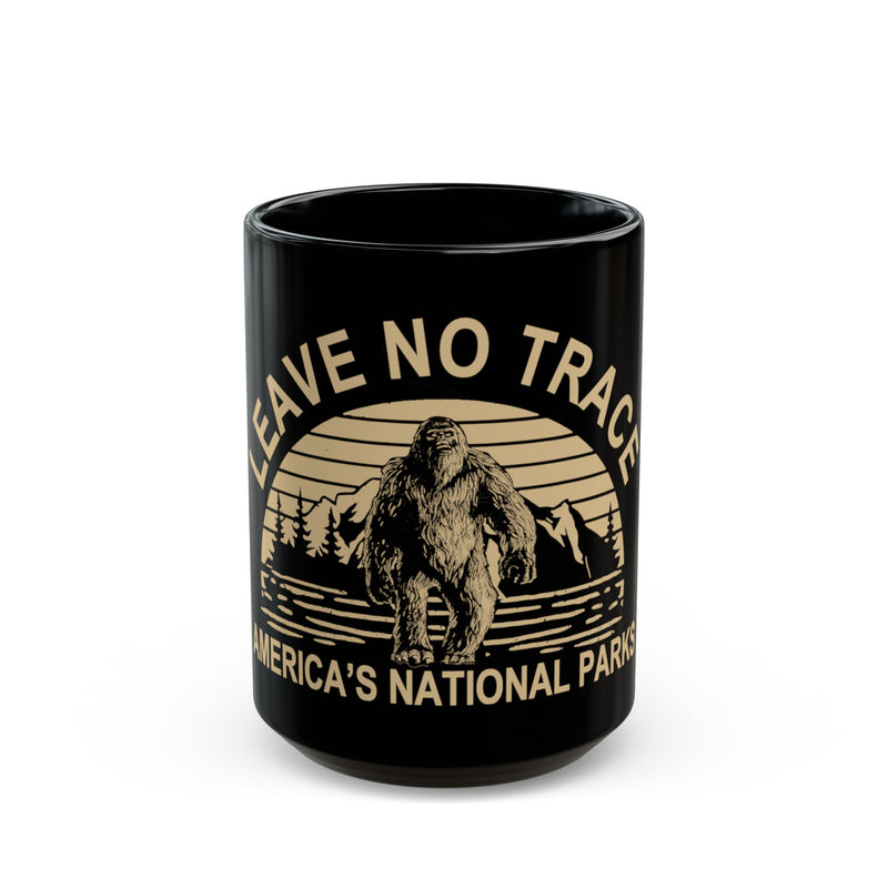 Ceramic mug featuring Bigfoot graphic and "Leave No Trace" text, highlighting Kenai Fjords National Park scenery.