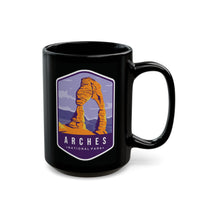 Ceramic coffee mug featuring a scenic design with Delicate Arch at Arches National Park.