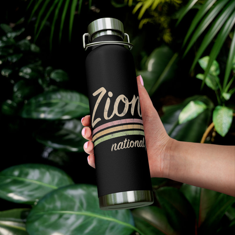 Image of a stainless steel water bottle featuring a retro design from Zion National Park in Utah.