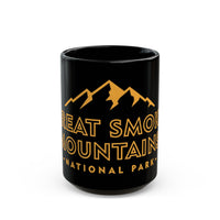 Ceramic mug featuring an illustration of Great Smoky Mountains National Park with mountain peaks and text.