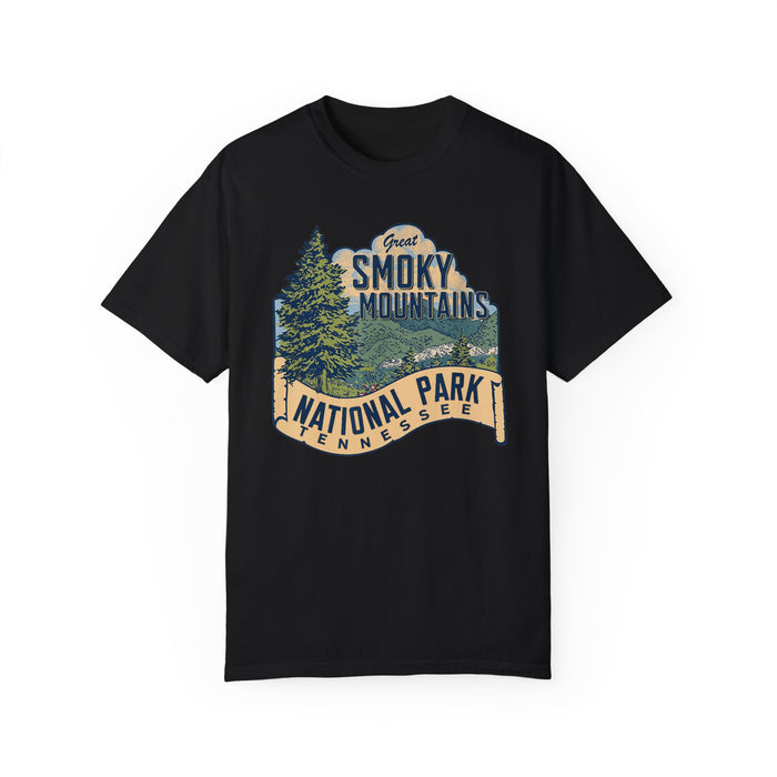 A T-shirt featuring a scenic design of the Great Smoky Mountains with trees and a mountain range, labeled "Great Smoky Mountains National Park, Tennessee."