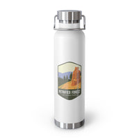 White stainless steel water bottle featuring a Petrified Forest National Park design with a tall petrified tree.