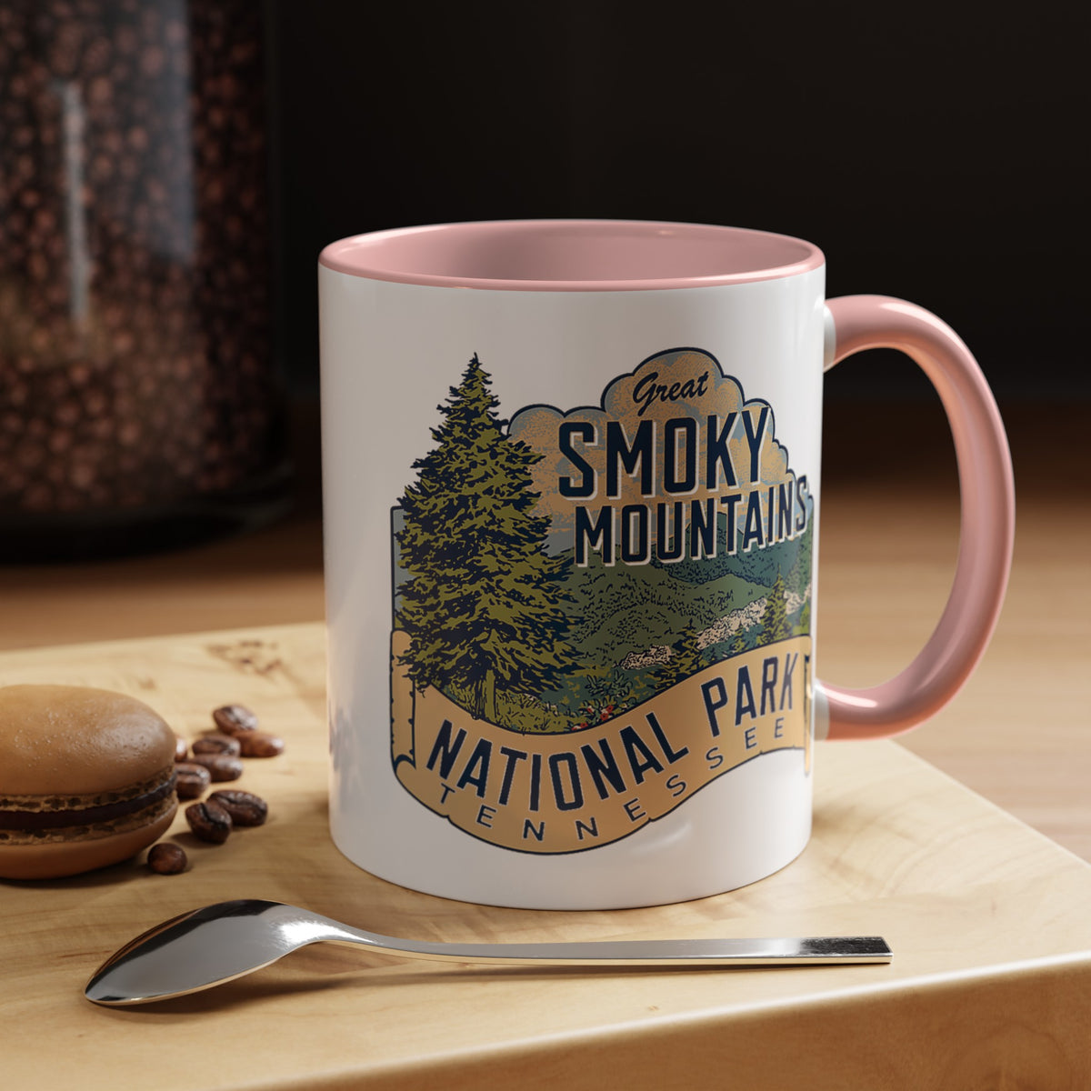 11 oz pink ceramic mug featuring an illustration of Great Smoky Mountains National Park with a scenic view and trees, labeled Tennessee.