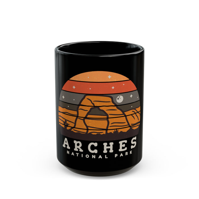 Ceramic mug featuring a scenic desert landscape design of Arches National Park, perfect as a souvenir.