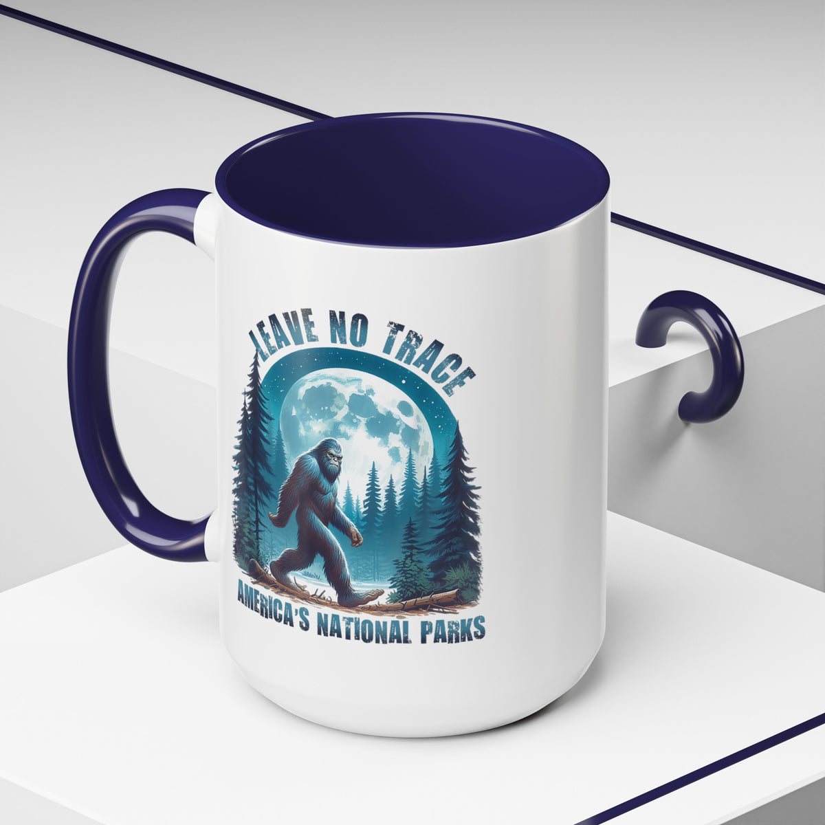 15 oz navy ceramic mug with Bigfoot graphic and "Leave No Trace" text, featuring Yosemite National Park scenery.