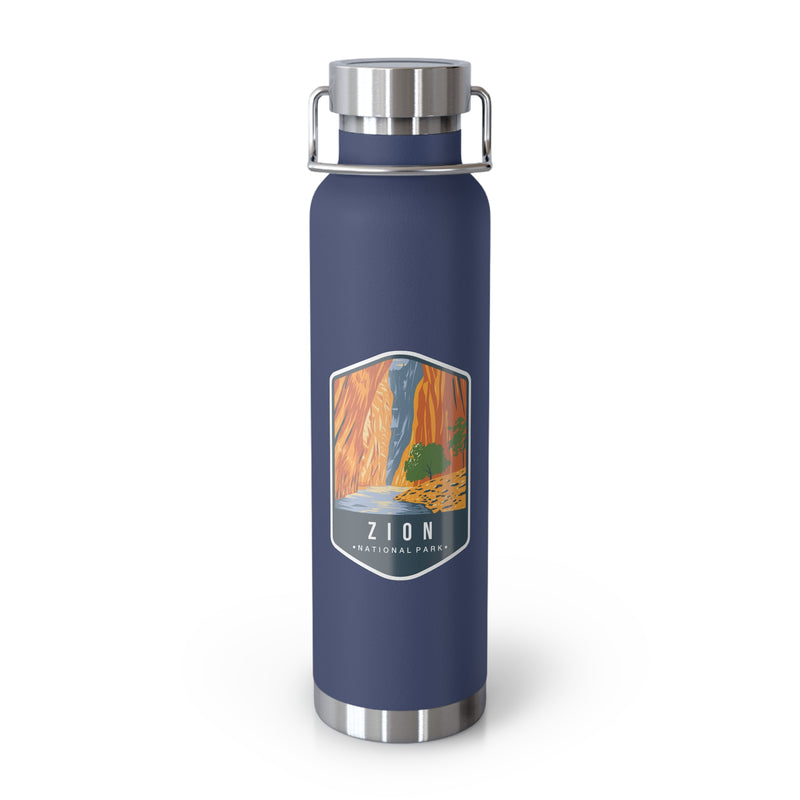 Navy stainless steel water bottle featuring a design of Zion National Park with a waterfall and canyon scenery.