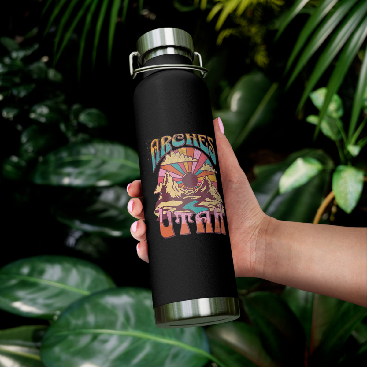 Image of a stainless steel water bottle featuring a design from Arches National Park in Utah.