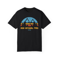 T-shirt featuring a silhouette design of Zion National Park with mountains and trees.