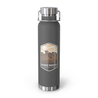 Grey stainless steel water bottle featuring a design of Theodore Roosevelt National Park with scenic rock formations.