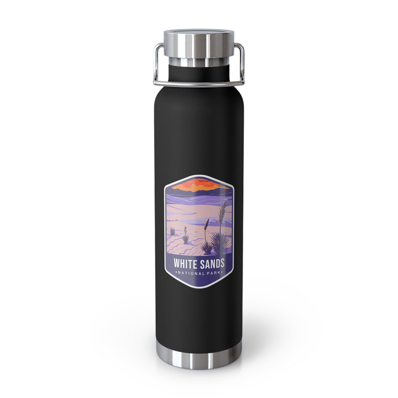 Black stainless steel water bottle featuring a design of White Sands National Park with desert and sunset scenery.