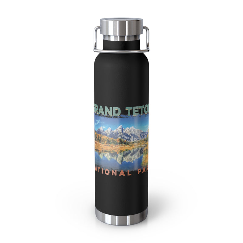 Grand Teton National Park souvenir water bottle featuring a scenic mountain reflection design with stainless steel construction.