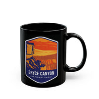 Ceramic mug featuring a scenic design with cliffs and a sunset, representing Bryce Canyon National Park.