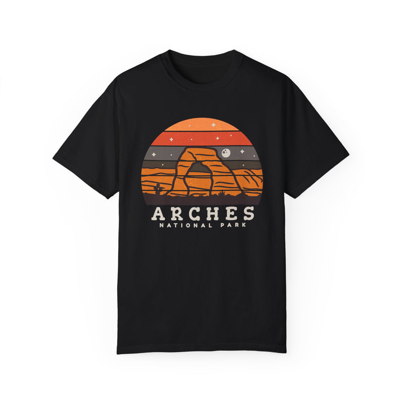 T-shirt featuring a sunset design with an arch, representing Arches National Park in Utah.