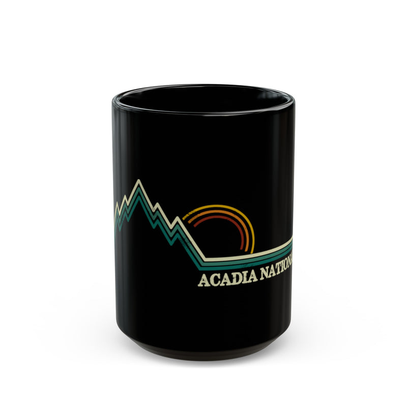 Ceramic coffee mug featuring a sunrise and mountain design with Acadia National Park.