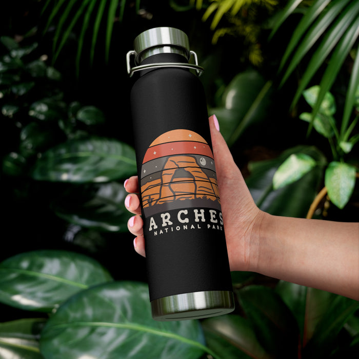 Image of a stainless steel water bottle featuring a design from Arches National Park in Utah.