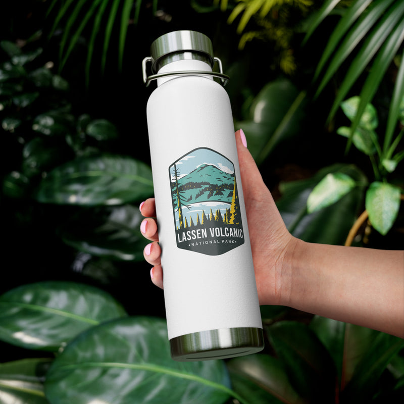 White stainless steel water bottle with a scenic design of Lassen Volcanic National Park.