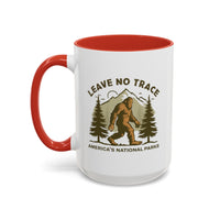 15 oz red Bigfoot souvenir mug with "Leave No Trace" text, trees, and mountains in the background, from America's National Parks.