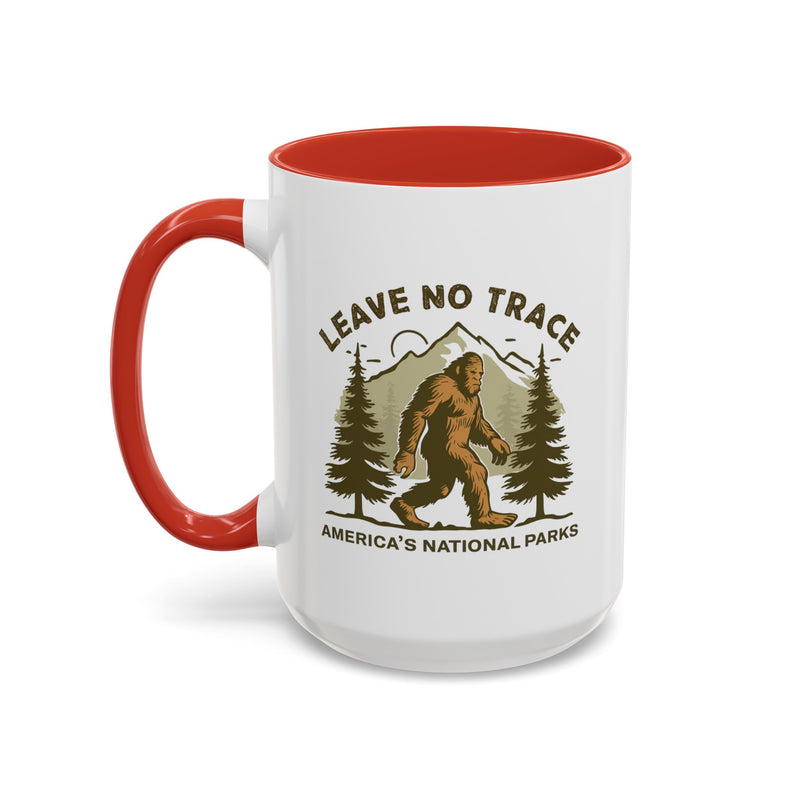 15 oz red Bigfoot souvenir mug with "Leave No Trace" text, trees, and mountains in the background, from America's National Parks.