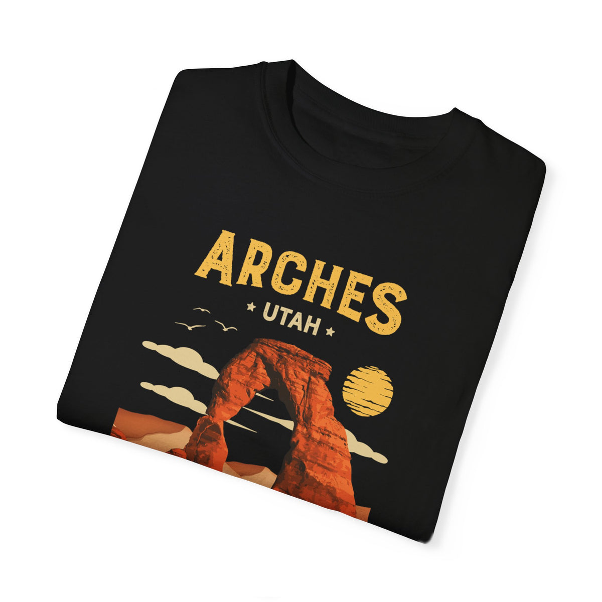 T-shirt featuring a sunset design with an arch, representing Arches National Park in Utah.