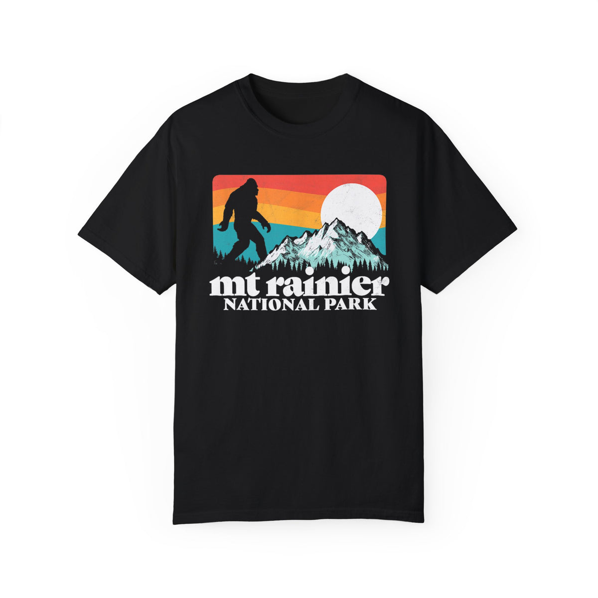 T-shirt featuring a retro design with a silhouette of Bigfoot, a mountain, and the text "Mt Rainier National Park."