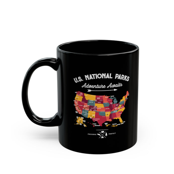 Black ceramic mug featuring a colorful map design of U.S. National Parks with the text "U.S. National Parks Adventure Awaits."