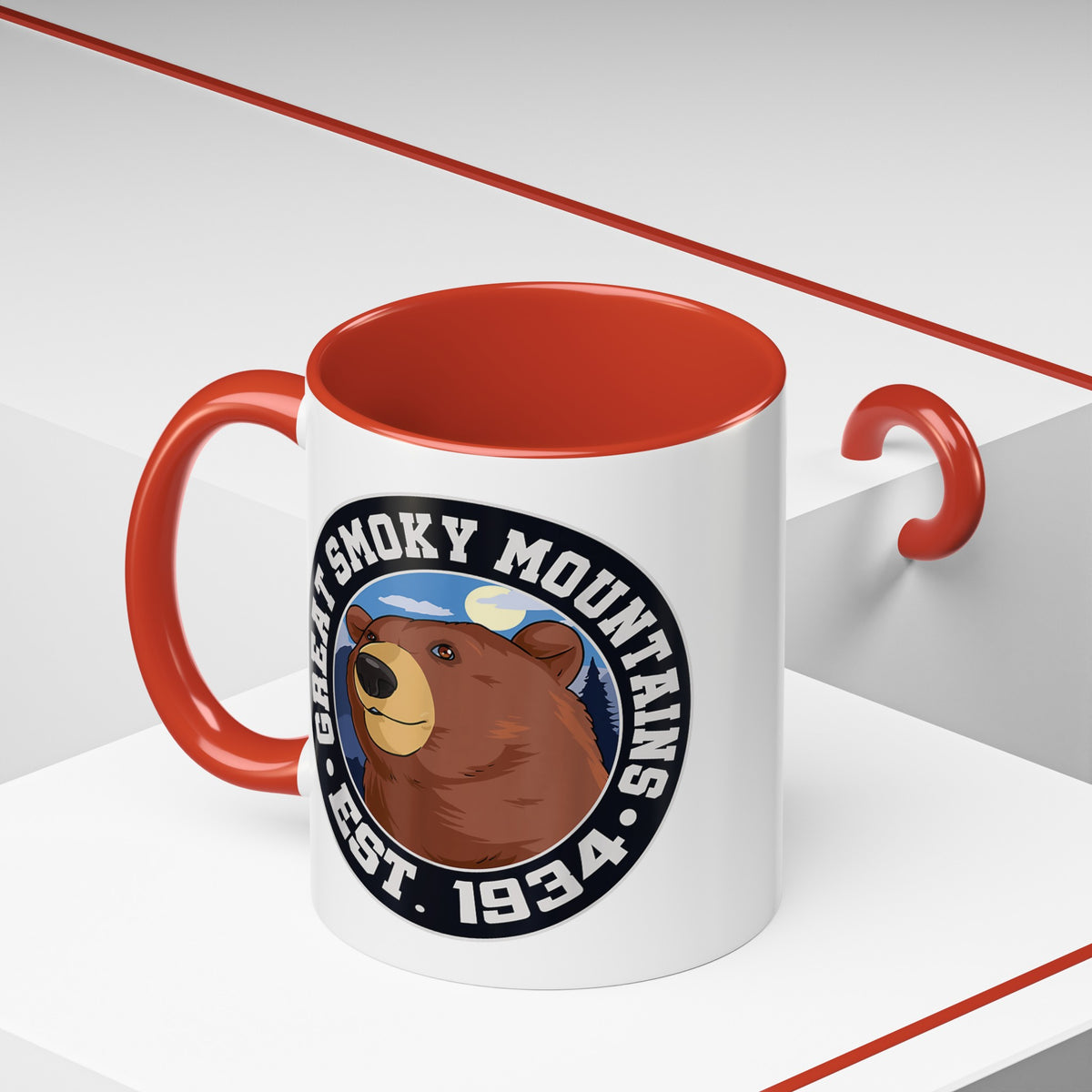 11 oz red ceramic mug featuring an illustration of a bear with the text "Great Smoky Mountains Est. 1934."