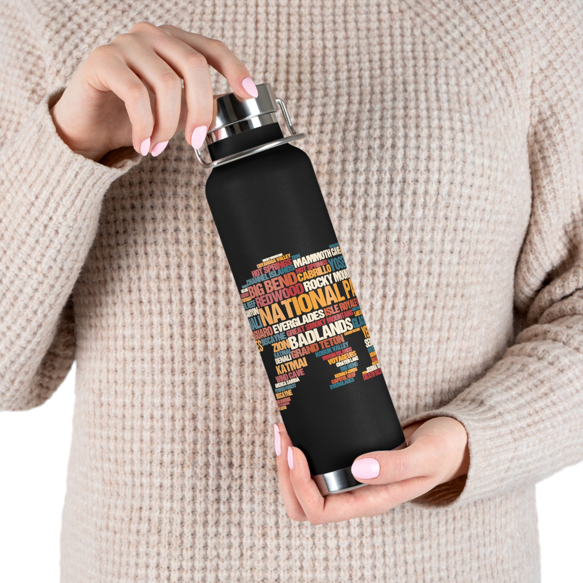 22oz vacuum insulated stainless steel water bottle with a word cloud design featuring names of various national parks.